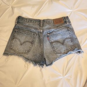 Levi high rise Jean shorts size 26 distrtressed